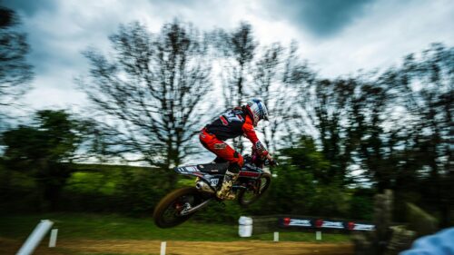 Motocross Rider Jumping in Mid-Air Action PC Wallpaper