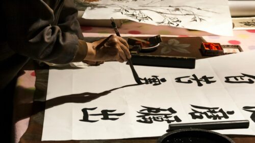 Chinese Calligraphy Master Writing Ink Characters 4K Desktop Wallpaper
