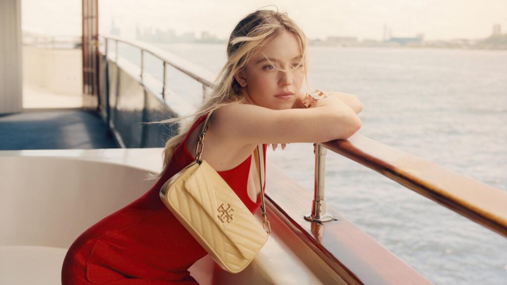 Sydney Sweeney in Red Dress on Luxury Yacht Desktop Wallpaper