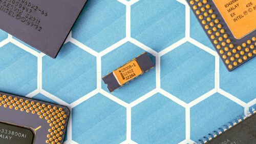 Vintage Intel Microprocessor Collection on Blue Hexagonal Grid PC Wallpaper