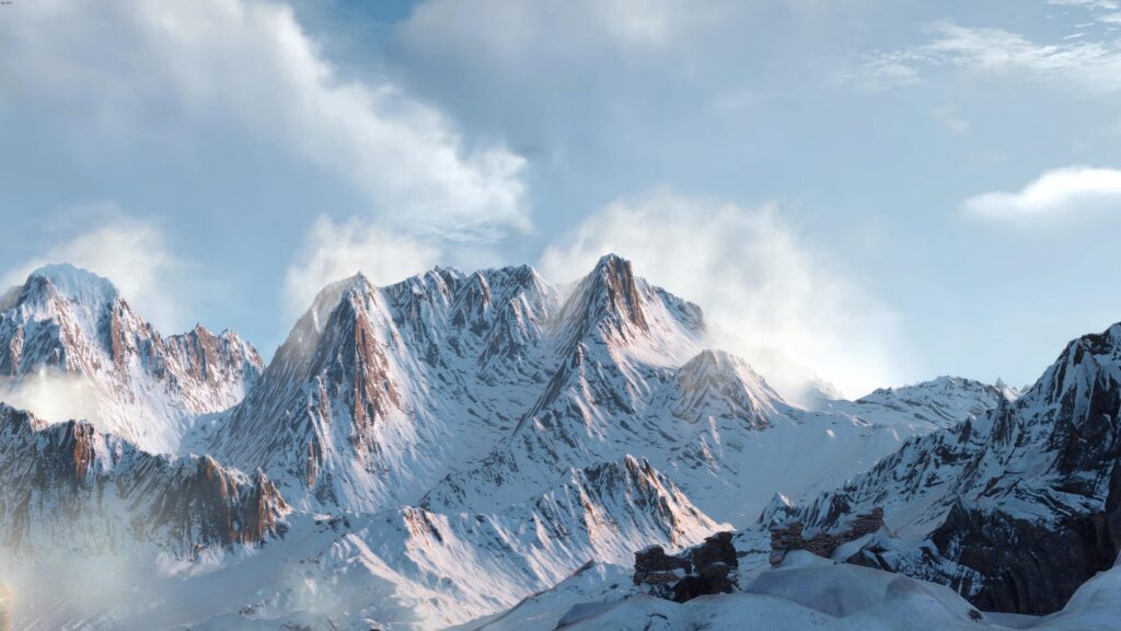 Majestic Snowy Mountain Peaks Under Clear Blue Sky 4K PC Wallpaper