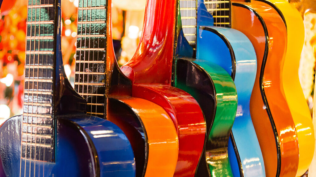 Colorful Acoustic Guitars Vibrant Musical Instruments 4K Desktop Wallpaper