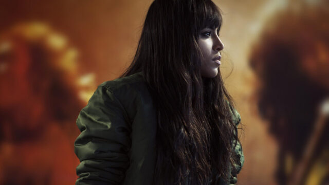 Cinematic Portrait of a Young Woman in Green Bomber Jacket 4K Wallpaper