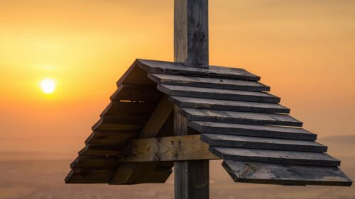Rustic Wooden Cross Against A Golden Sunset 4K Desktop Wallpaper