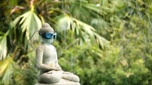 Funny Buddha Statue Wearing Swimming Goggles 4K Wallpaper