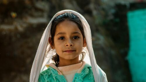 Portrait of a Beautiful Young Girl with a White Headscarf 4K Wallpaper