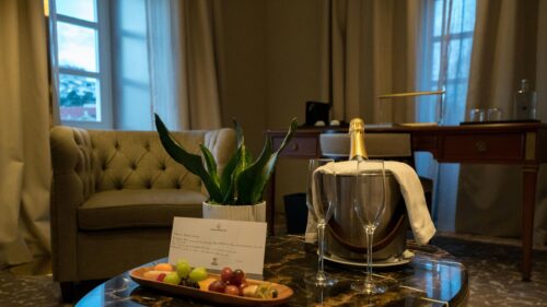 Luxury Hotel Room Welcome Champagne and Fruit Plate 4K Desktop Wallpaper