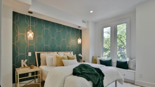Modern Bedroom Interior with Green Geometric Wallpaper 4K Wallpaper