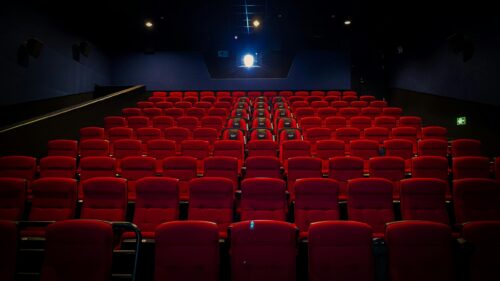 Cinematic Empty Red Cinema Movie Theater 4K Wallpaper