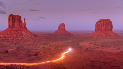 Monument Valley Red Rock Landscape with Light Trail 4K Wallpaper