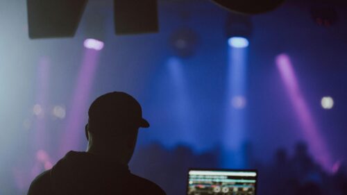 DJ Silhouette at Nightclub Electronic Music Event 4K Wallpaper