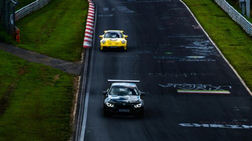 Porsche GT3 RS and BMW M4 GT on Nurburgring Track 4K Wallpaper
