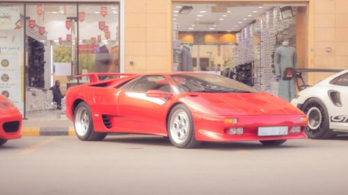 Red Lamborghini Diablo Exotic Sports Car Parking Scene 4K Wallpaper