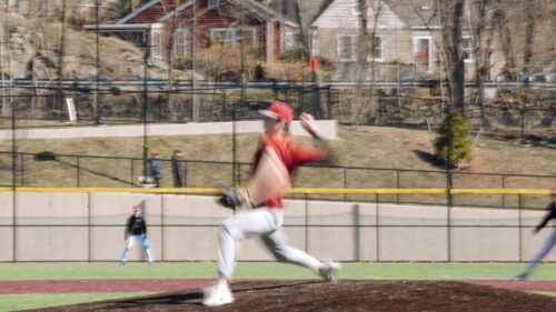Dynamic Baseball Pitcher in Motion Action Shot 4K Wallpaper
