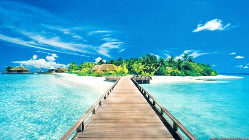 Breathtaking Tropical Island Pier with Turquoise Ocean Waters Desktop Wallpaper