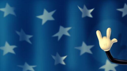 Mickey Mouse Hand Gesture with Blue Starry Background 4K Wallpaper