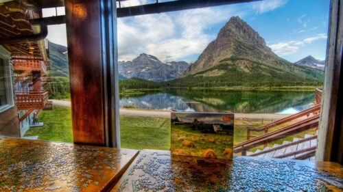 Breathtaking Mountain Lake View from a Cozy Lodge Window 4K Wallpaper