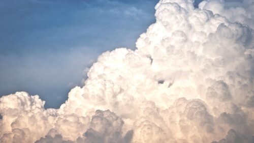 Stunning Cumulus Clouds Against Deep Blue Sky 4K Desktop Wallpaper