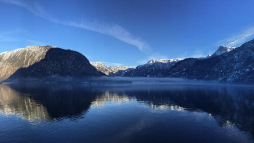 Breathtaking Alpine Mountain Lake Landscape with Morning Mist PC Wallpaper