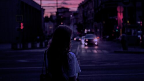 Lonely Girl Standing on City Street at Twilight 4K PC Wallpaper