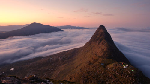 Breathtaking Mountain Peak Above Sea of Clouds at Sunset PC Wallpaper