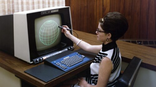 Vintage Retro Computing Woman with Graphic Terminal 4K Wallpaper