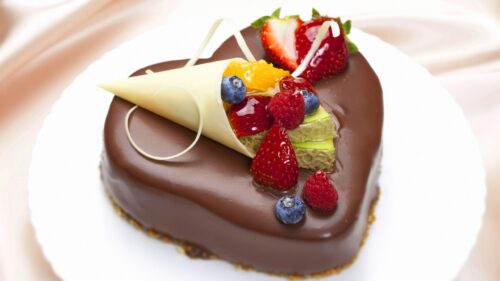 Delicious Heart Shaped Chocolate Cake with Fresh Fruit Topping PC Wallpaper
