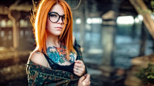 Beautiful Redhead Girl with Tattoos and Glasses PC Wallpaper