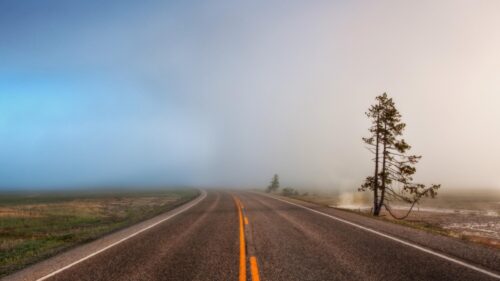 Empty Road Through Misty Landscape Scenic Desktop Wallpaper