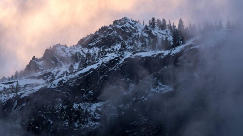 Misty Snowy Mountain Peak at Sunset Desktop Wallpaper