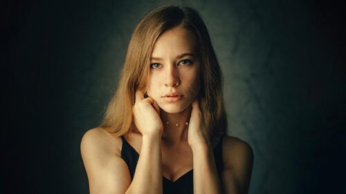 Stunning Portrait of a Young Woman with Natural Beauty Desktop Wallpaper