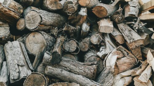 Rustic Stacked Firewood Logs Texture PC Wallpaper