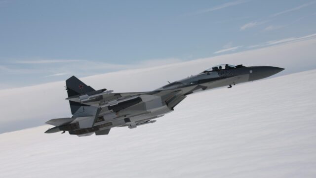 Russian Sukhoi Su-35S Fighter Jet Flying Above the Clouds Desktop Wallpaper