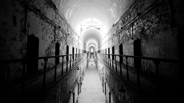 Abandoned Prison Corridor Gothic Architecture Black and White 4K Desktop Wallpaper