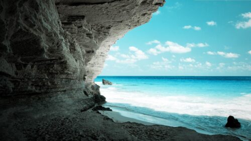 Stunning Sea Cave Overlooking Tropical Turquoise Waters Desktop Wallpaper