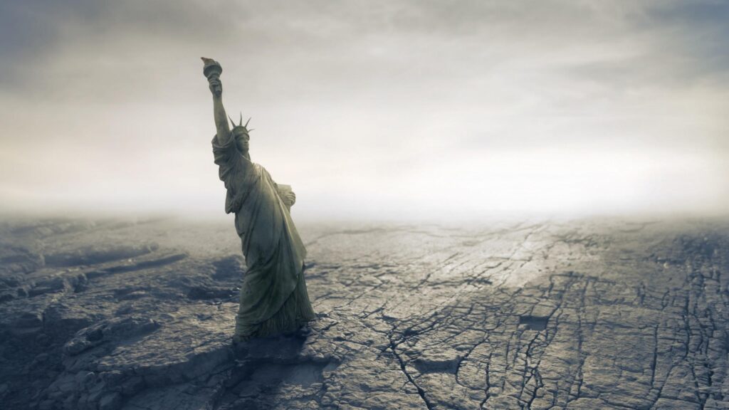 Post-Apocalyptic Statue of Liberty in a Barren Wasteland 4K Wallpaper