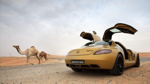 Gold Mercedes-Benz SLS AMG in Desert Landscape 4K Wallpaper