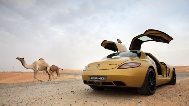Gold Mercedes-Benz SLS AMG in Desert Landscape 4K Wallpaper