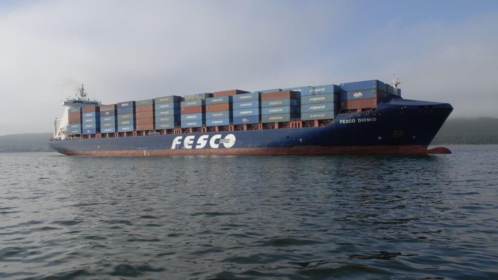 FESCO Diomid Cargo Ship Sailing in Misty Waters Desktop Wallpaper