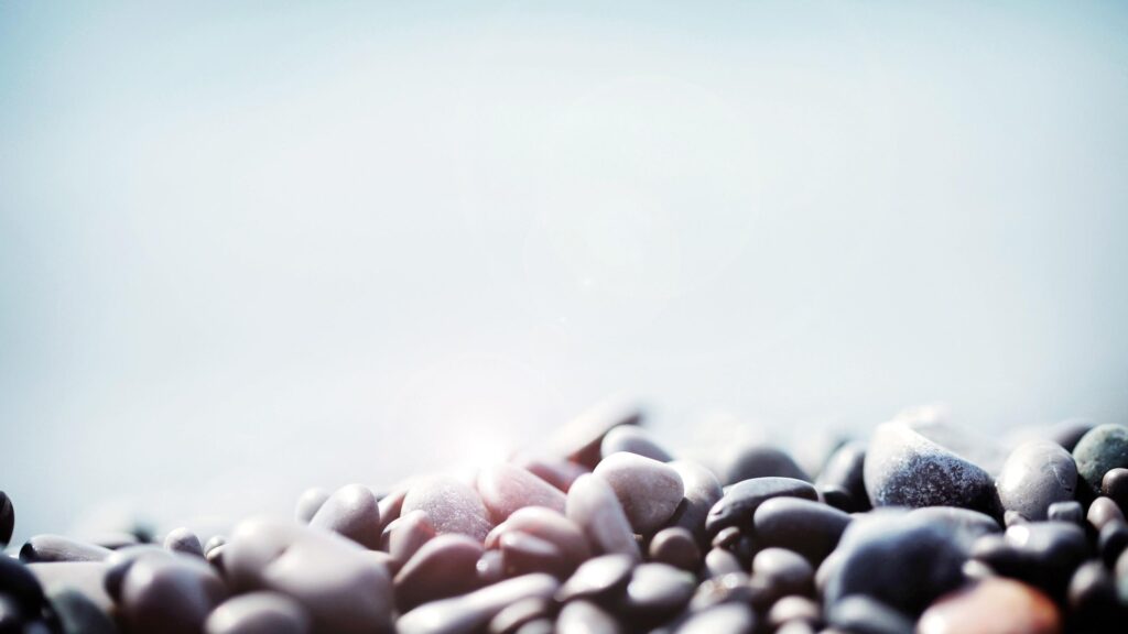 Sunlit Smooth Sea Pebbles Close Up Macro Desktop Wallpaper
