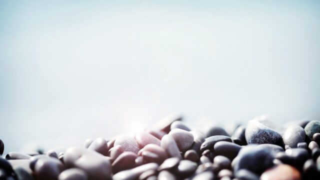 Sunlit Smooth Sea Pebbles Close Up Macro Desktop Wallpaper