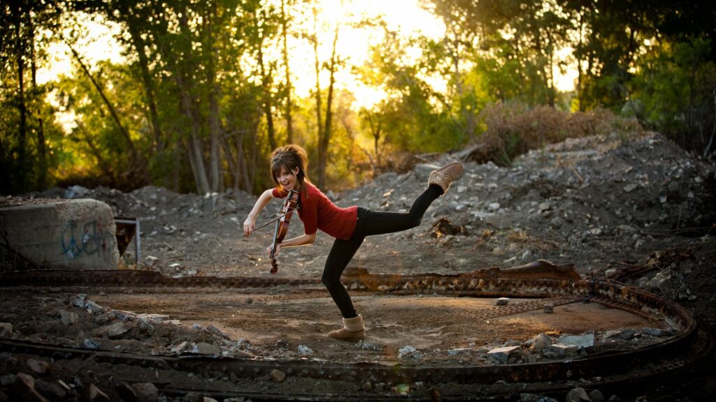Girl Playing Violin in Golden Hour Sunlight Desktop Wallpaper