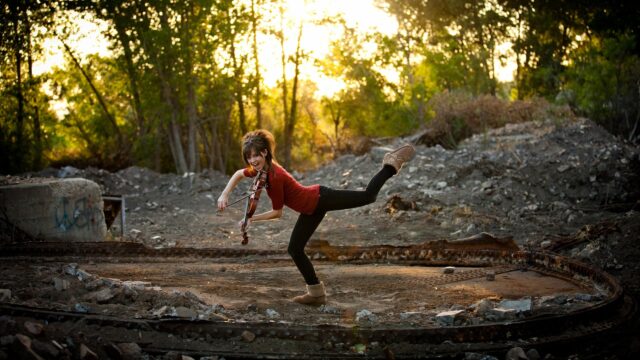 Girl Playing Violin in Golden Hour Sunlight Desktop Wallpaper