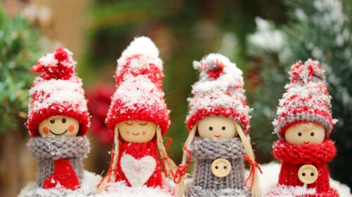 Charming Miniature Christmas Dolls in Snow 4K Desktop Wallpaper