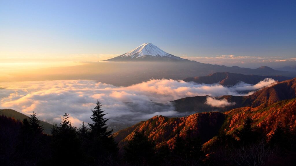 Breathtaking Mount Fuji Above a Sea of Clouds at Sunrise 4K Desktop Wallpaper
