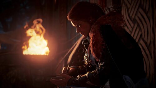Eivor Varinsdottir Writing by Firelight Assassin’s Creed Valhalla 4K Desktop Wallpaper