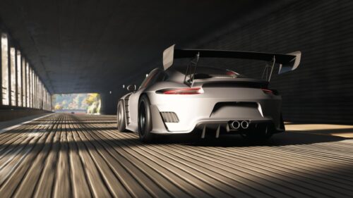 Silver Porsche 911 GT3 RS Driving Through a Cinematic Tunnel 4K Wallpaper