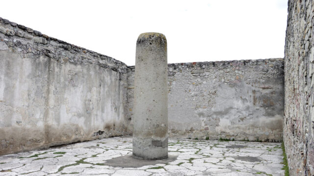 Ancient Stone Column in Historic Mexican Ruins Desktop Wallpaper