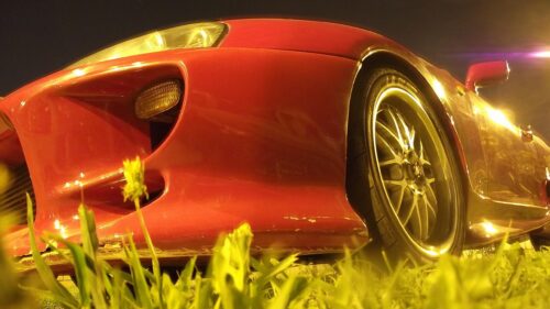 Low Angle Shot of Red Toyota Supra Sports Car at Night Desktop Wallpaper