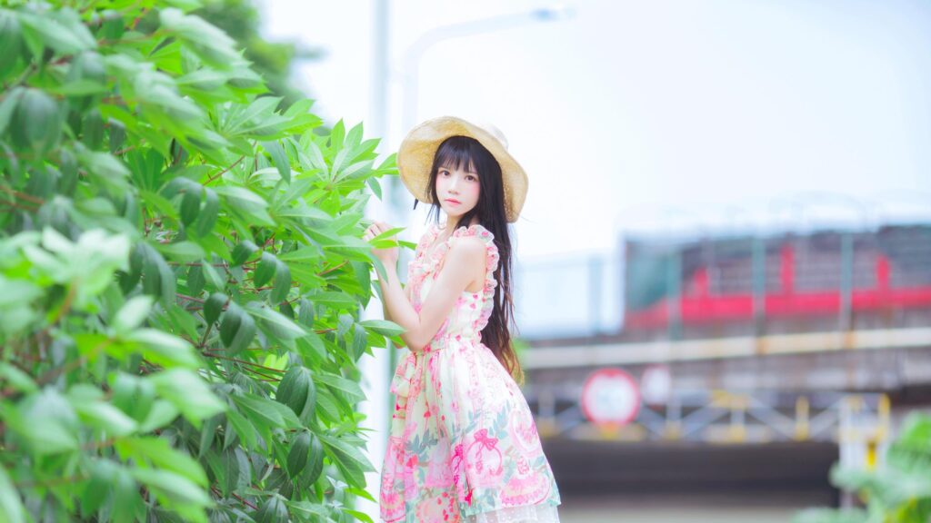 Beautiful Girl in Floral Summer Dress and Straw Hat by Lush Greenery Desktop Wallpaper